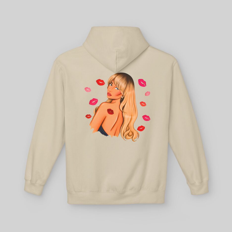 Beige Sabrina Carpenter Fall in Love Hoodie with a graphic of a woman with long blonde hair and red lipstick on a light gray background